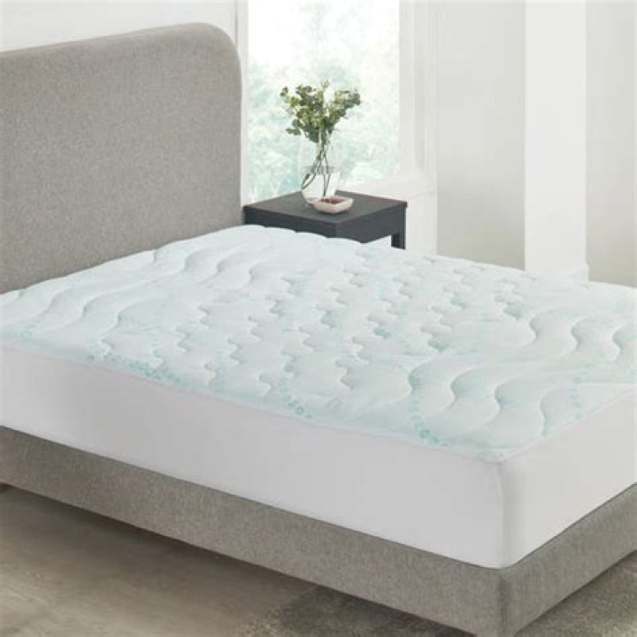 Do you put a sheet over a cooling mattress pad
