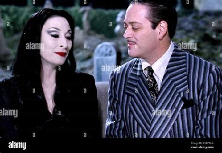 How old is Anjelica Huston in Addams family?