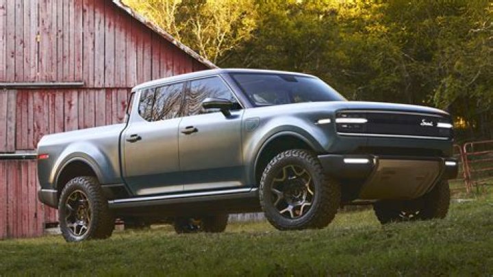 Who bought out checker auto